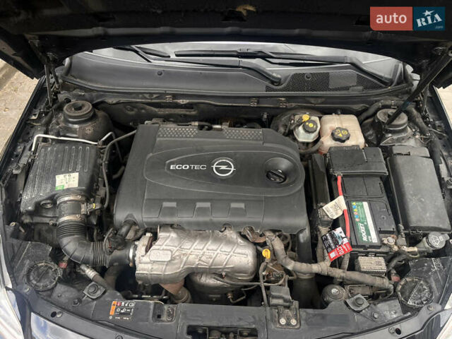 Черный Опель Инсигния, объемом двигателя 1.96 л и пробегом 300 тыс. км за 10400 $, фото 43 на Automoto.ua