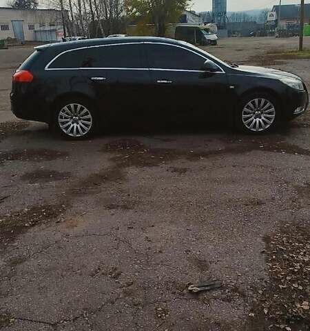 Черный Опель Инсигния, объемом двигателя 1.96 л и пробегом 298 тыс. км за 10000 $, фото 1 на Automoto.ua