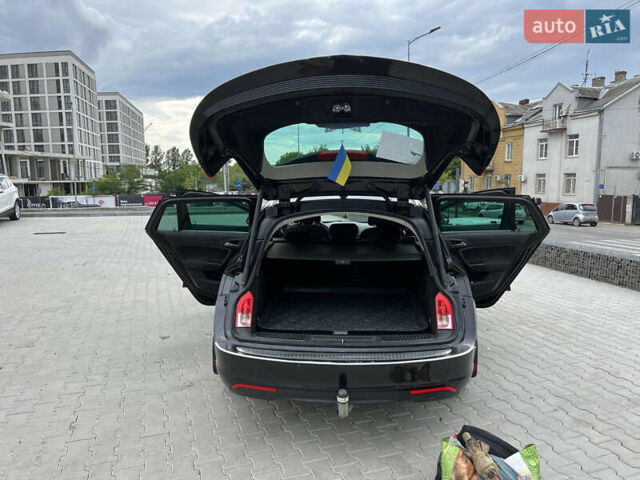 Черный Опель Инсигния, объемом двигателя 1.96 л и пробегом 230 тыс. км за 8500 $, фото 8 на Automoto.ua