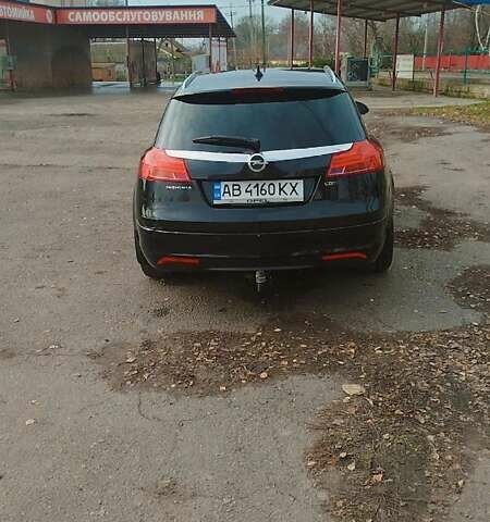 Черный Опель Инсигния, объемом двигателя 1.96 л и пробегом 298 тыс. км за 10000 $, фото 2 на Automoto.ua