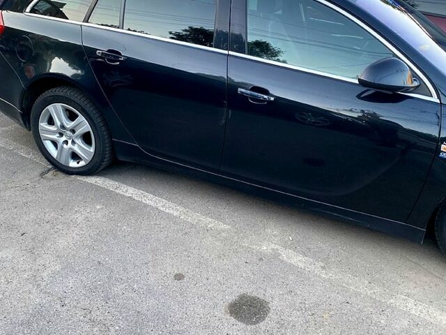 Черный Опель Инсигния, объемом двигателя 2 л и пробегом 200 тыс. км за 9500 $, фото 1 на Automoto.ua