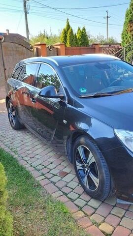 Чорний Опель Інсігнія, об'ємом двигуна 1.96 л та пробігом 275 тис. км за 7500 $, фото 1 на Automoto.ua