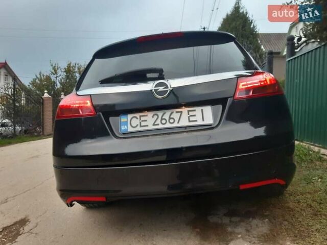 Чорний Опель Інсігнія, об'ємом двигуна 2 л та пробігом 214 тис. км за 12000 $, фото 4 на Automoto.ua