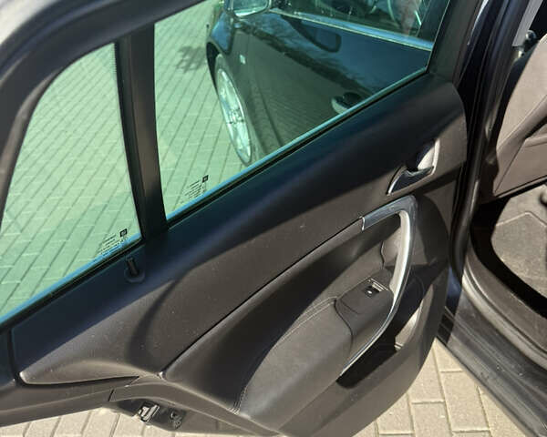 Черный Опель Инсигния, объемом двигателя 1.96 л и пробегом 394 тыс. км за 6000 $, фото 4 на Automoto.ua