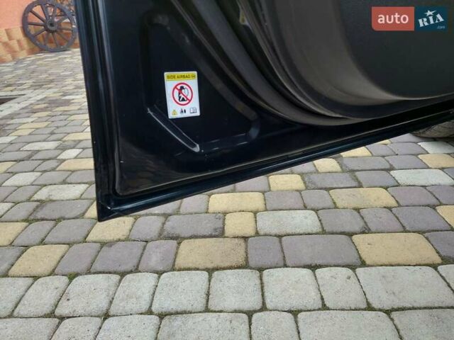 Черный Опель Инсигния, объемом двигателя 2 л и пробегом 199 тыс. км за 9700 $, фото 4 на Automoto.ua