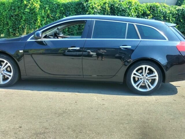 Чорний Опель Інсігнія, об'ємом двигуна 2 л та пробігом 200 тис. км за 8300 $, фото 2 на Automoto.ua