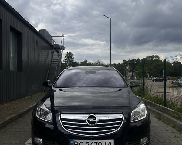 Черный Опель Инсигния, объемом двигателя 1.96 л и пробегом 300 тыс. км за 10400 $, фото 7 на Automoto.ua