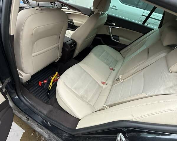 Черный Опель Инсигния, объемом двигателя 1.96 л и пробегом 263 тыс. км за 6500 $, фото 5 на Automoto.ua