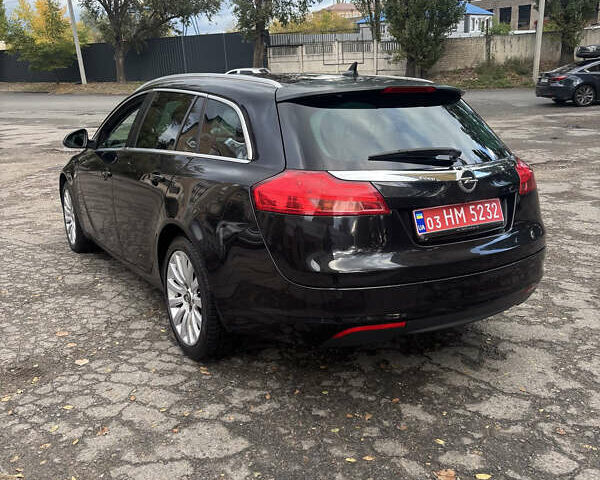 Черный Опель Инсигния, объемом двигателя 1.96 л и пробегом 333 тыс. км за 9950 $, фото 3 на Automoto.ua
