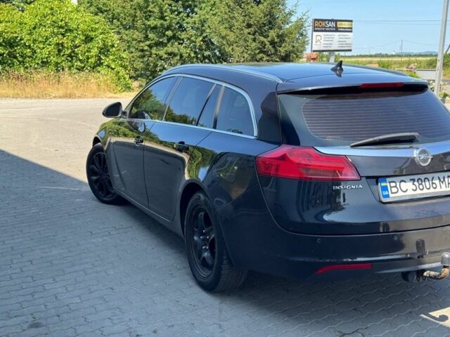 Чорний Опель Інсігнія, об'ємом двигуна 2 л та пробігом 320 тис. км за 6900 $, фото 3 на Automoto.ua