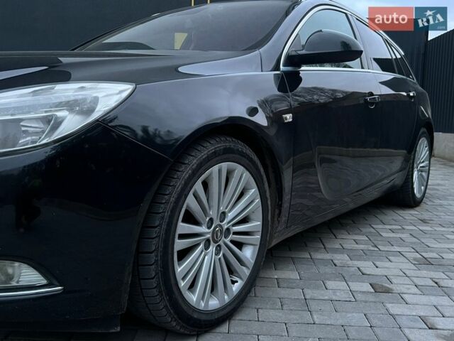 Чорний Опель Інсігнія, об'ємом двигуна 1.96 л та пробігом 262 тис. км за 7600 $, фото 4 на Automoto.ua