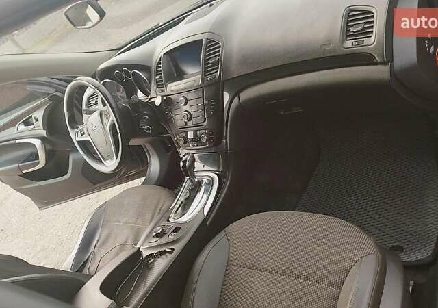 Черный Опель Инсигния, объемом двигателя 1.96 л и пробегом 298 тыс. км за 10000 $, фото 7 на Automoto.ua