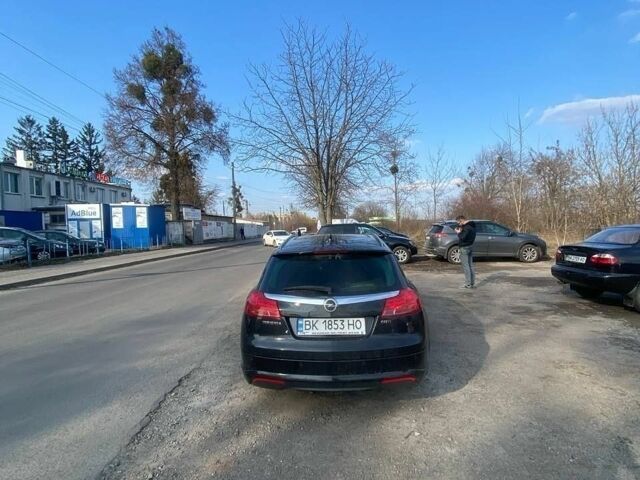 Чорний Опель Інсігнія, об'ємом двигуна 2 л та пробігом 350 тис. км за 7494 $, фото 2 на Automoto.ua