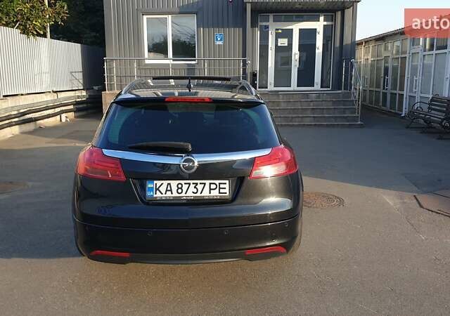 Черный Опель Инсигния, объемом двигателя 1.96 л и пробегом 315 тыс. км за 9000 $, фото 2 на Automoto.ua