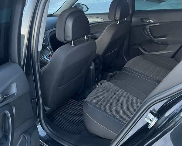 Чорний Опель Інсігнія, об'ємом двигуна 1.96 л та пробігом 232 тис. км за 8600 $, фото 9 на Automoto.ua