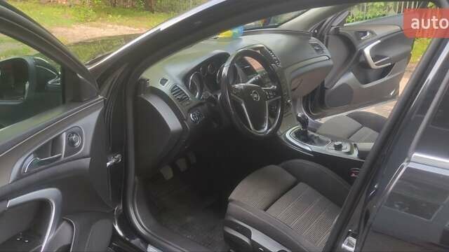 Черный Опель Инсигния, объемом двигателя 2 л и пробегом 238 тыс. км за 8050 $, фото 2 на Automoto.ua