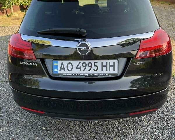 Черный Опель Инсигния, объемом двигателя 1.96 л и пробегом 223 тыс. км за 8300 $, фото 5 на Automoto.ua