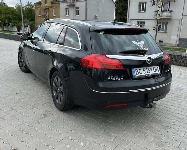 Черный Опель Инсигния, объемом двигателя 1.96 л и пробегом 230 тыс. км за 8500 $, фото 24 на Automoto.ua