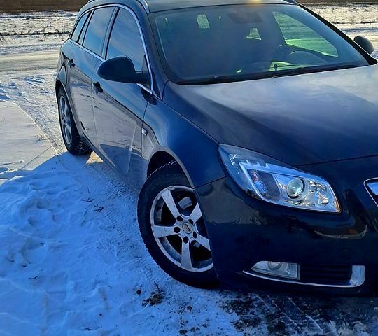 Черный Опель Инсигния, объемом двигателя 1.8 л и пробегом 24000 тыс. км за 6500 $, фото 4 на Automoto.ua