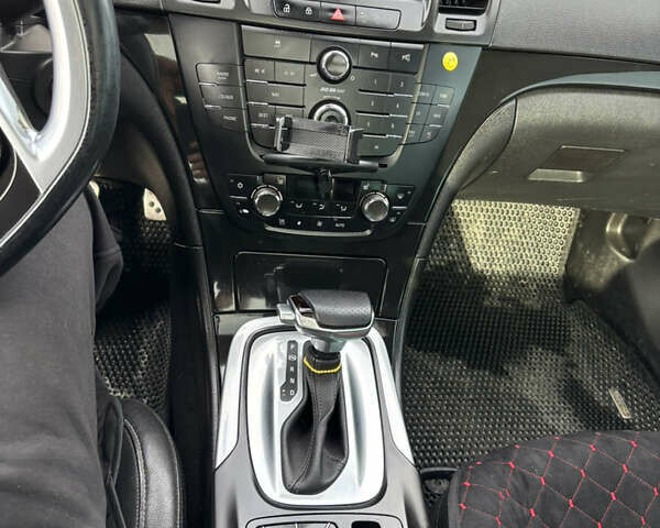 Чорний Опель Інсігнія, об'ємом двигуна 1.96 л та пробігом 272 тис. км за 9700 $, фото 8 на Automoto.ua