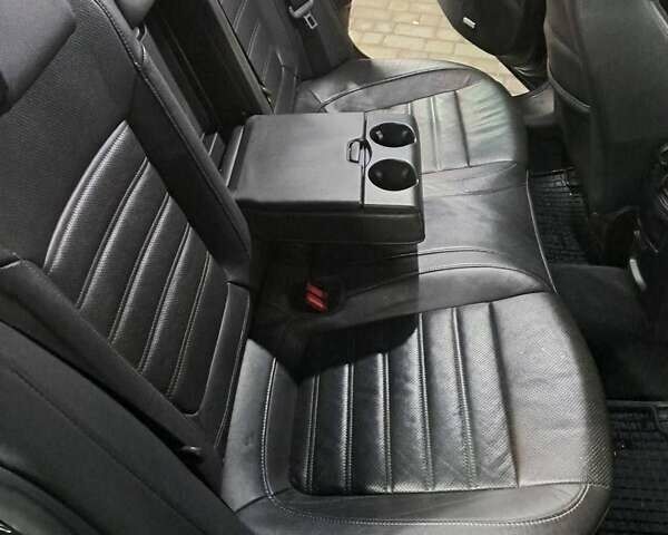 Черный Опель Инсигния, объемом двигателя 2 л и пробегом 350 тыс. км за 7999 $, фото 1 на Automoto.ua