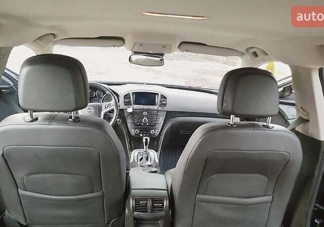 Черный Опель Инсигния, объемом двигателя 1.96 л и пробегом 298 тыс. км за 10000 $, фото 5 на Automoto.ua