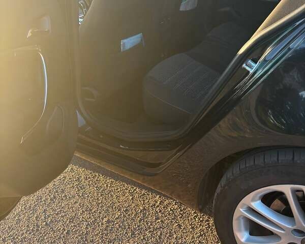 Черный Опель Инсигния, объемом двигателя 1.96 л и пробегом 226 тыс. км за 2900 $, фото 9 на Automoto.ua