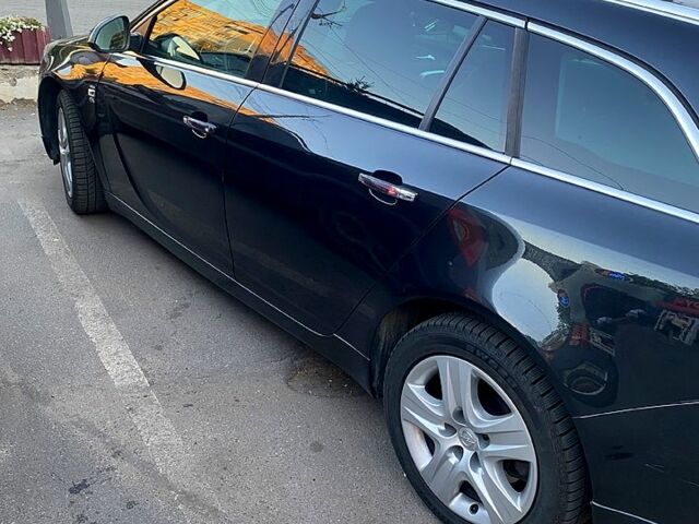 Черный Опель Инсигния, объемом двигателя 2 л и пробегом 200 тыс. км за 9500 $, фото 5 на Automoto.ua