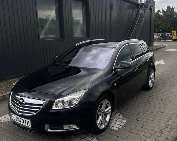 Черный Опель Инсигния, объемом двигателя 1.96 л и пробегом 300 тыс. км за 10400 $, фото 11 на Automoto.ua