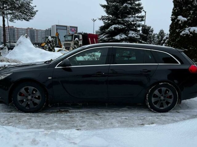 Чорний Опель Інсігнія, об'ємом двигуна 2 л та пробігом 231 тис. км за 8999 $, фото 3 на Automoto.ua