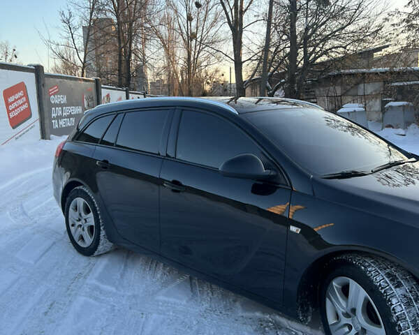 Чорний Опель Інсігнія, об'ємом двигуна 1.96 л та пробігом 232 тис. км за 8600 $, фото 5 на Automoto.ua