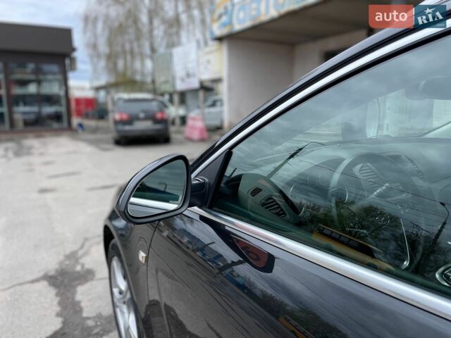 Чорний Опель Інсігнія, об'ємом двигуна 1.96 л та пробігом 249 тис. км за 10350 $, фото 87 на Automoto.ua