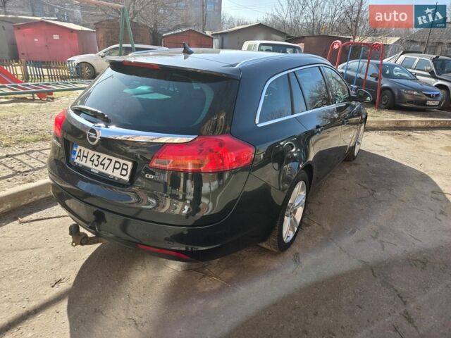 Черный Опель Инсигния, объемом двигателя 1.96 л и пробегом 273 тыс. км за 7500 $, фото 22 на Automoto.ua