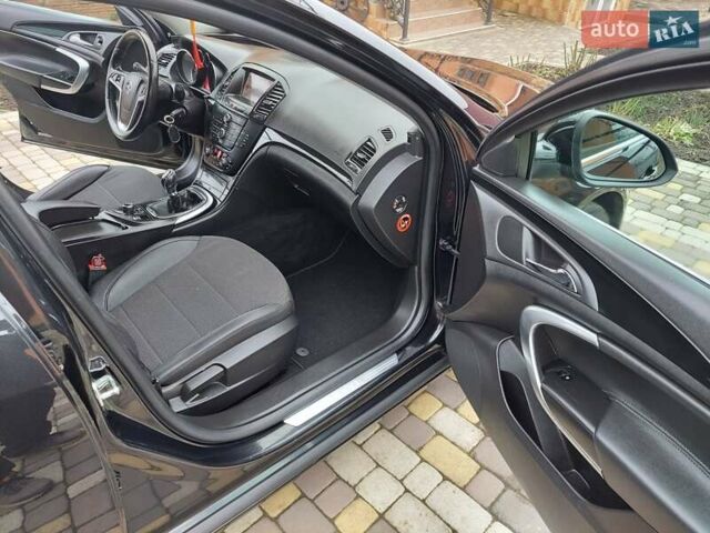 Черный Опель Инсигния, объемом двигателя 2 л и пробегом 199 тыс. км за 9700 $, фото 23 на Automoto.ua