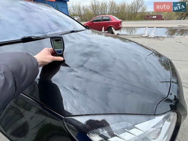 Чорний Опель Інсігнія, об'ємом двигуна 1.96 л та пробігом 249 тис. км за 10350 $, фото 140 на Automoto.ua