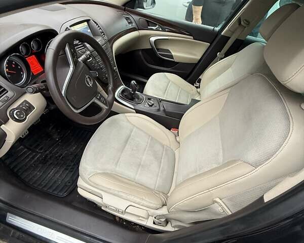 Черный Опель Инсигния, объемом двигателя 1.96 л и пробегом 263 тыс. км за 6500 $, фото 6 на Automoto.ua