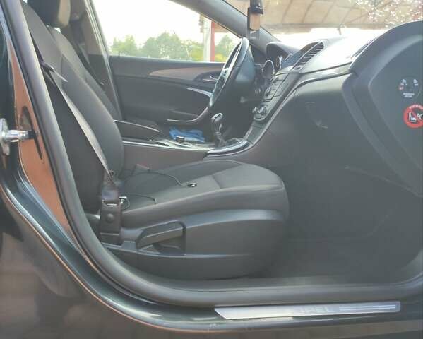 Чорний Опель Інсігнія, об'ємом двигуна 1.96 л та пробігом 238 тис. км за 7800 $, фото 1 на Automoto.ua