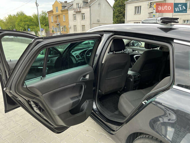 Черный Опель Инсигния, объемом двигателя 1.96 л и пробегом 230 тыс. км за 8500 $, фото 16 на Automoto.ua