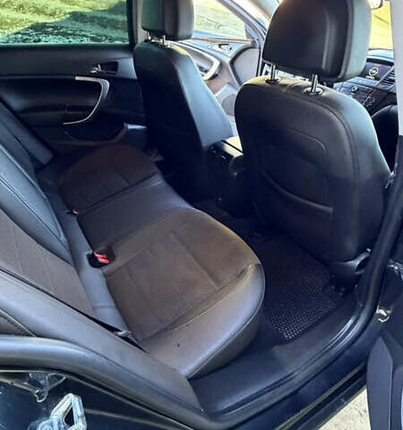 Черный Опель Инсигния, объемом двигателя 1.96 л и пробегом 290 тыс. км за 7950 $, фото 56 на Automoto.ua