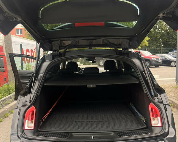 Черный Опель Инсигния, объемом двигателя 1.96 л и пробегом 300 тыс. км за 10400 $, фото 27 на Automoto.ua