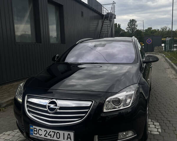 Черный Опель Инсигния, объемом двигателя 1.96 л и пробегом 300 тыс. км за 10400 $, фото 9 на Automoto.ua