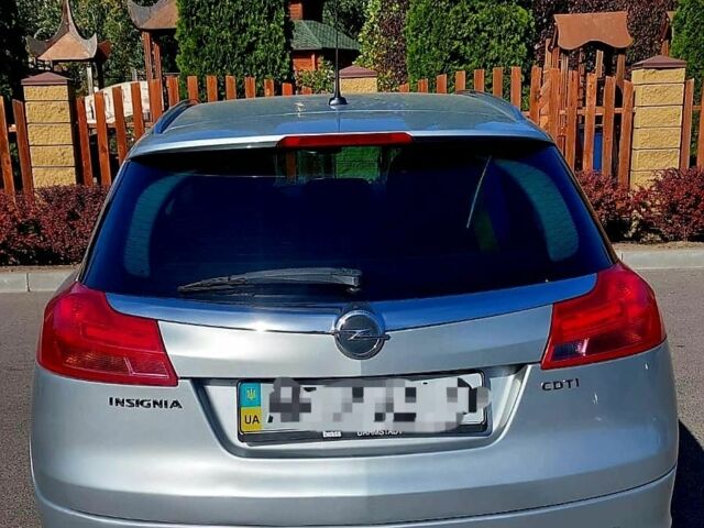 Черный Опель Инсигния, объемом двигателя 1.6 л и пробегом 256 тыс. км за 8000 $, фото 2 на Automoto.ua