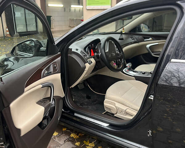 Черный Опель Инсигния, объемом двигателя 2 л и пробегом 251 тыс. км за 9000 $, фото 2 на Automoto.ua