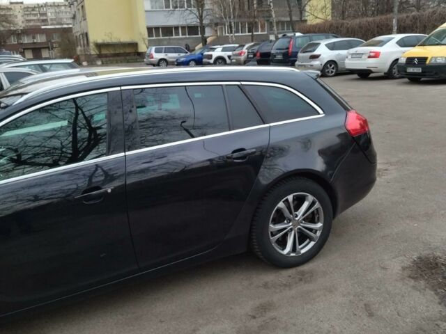 Черный Опель Инсигния, объемом двигателя 2 л и пробегом 265 тыс. км за 10500 $, фото 7 на Automoto.ua