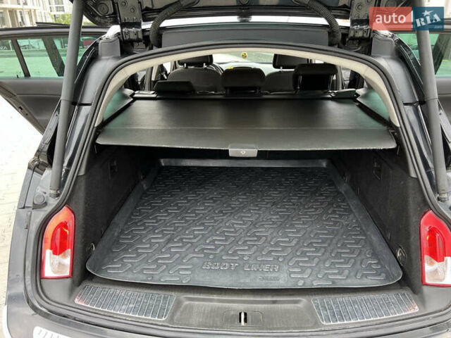 Черный Опель Инсигния, объемом двигателя 1.96 л и пробегом 230 тыс. км за 8500 $, фото 7 на Automoto.ua