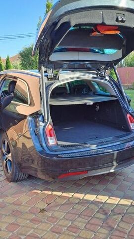 Чорний Опель Інсігнія, об'ємом двигуна 1.96 л та пробігом 275 тис. км за 7500 $, фото 5 на Automoto.ua