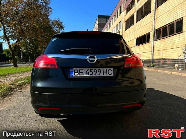 Чорний Опель Інсігнія, об'ємом двигуна 2 л та пробігом 29000 тис. км за 7250 $, фото 2 на Automoto.ua