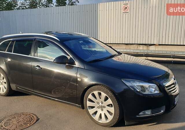 Черный Опель Инсигния, объемом двигателя 1.96 л и пробегом 315 тыс. км за 9000 $, фото 4 на Automoto.ua