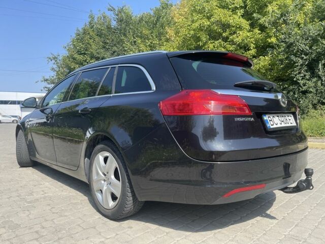 Чорний Опель Інсігнія, об'ємом двигуна 2 л та пробігом 340 тис. км за 6900 $, фото 1 на Automoto.ua