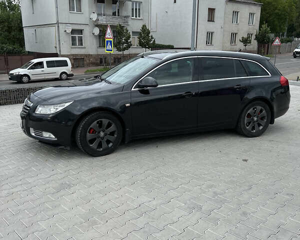 Черный Опель Инсигния, объемом двигателя 1.96 л и пробегом 230 тыс. км за 8500 $, фото 25 на Automoto.ua